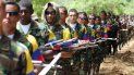 Unos 7.000 ahora excombatientes de las marxistas de las FARC, principal y más antigua guerrilla del continente, entregaron sus fusiles a la misión de la ONU Unos 7.000 ahora excombatientes de las marxistas de las FARC, principal y más antigua guerrilla del continente, entregaron sus fusiles a la misión de la ONU