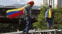 Un grupo de personas participa en una manifestación contra el régimen de Nicolás Maduro este sábado 12 de agosto de 2017, en Caracas, Venezuela. Un grupo de personas participa en una manifestación contra el régimen de Nicolás Maduro este sábado 12 de agosto de 2017, en Caracas, Venezuela.