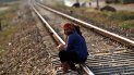 Dos jóvenes cubanas conversan sentadas en las vías del tren en el poblado de Guayacanes, en la central provincia de Ciego de Ávila, un domingo de abril de 2017. El servicio ferroviario está entre los que se han visto seriamente afectados por la actual crisis económica de la isla. Dos jóvenes cubanas conversan sentadas en las vías del tren en el poblado de Guayacanes, en la central provincia de Ciego de Ávila, un domingo de abril de 2017. El servicio ferroviario está entre los que se han visto seriamente afectados por la actual crisis económica de la isla.