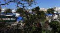 Casas afectadas por el paso de los huracanes permanecen con sus techos cubiertos por toldos en el barrio Santurce de San Juan, Puerto Rico. Casas afectadas por el paso de los huracanes permanecen con sus techos cubiertos por toldos en el barrio Santurce de San Juan, Puerto Rico.