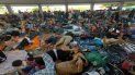 Migrantes hondureños tdescansan en el jardín Hidalgo de Tapachula, México. Migrantes hondureños tdescansan en el jardín Hidalgo de Tapachula, México.