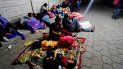 Migrantes hondureños duermen bajo una carpa en una calle de Esquipulas, Guatemala. Migrantes hondureños duermen bajo una carpa en una calle de Esquipulas, Guatemala.