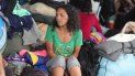 Una migrante venezolana espera en un punto de paso entre Ecuador y Perú. Una migrante venezolana espera en un punto de paso entre Ecuador y Perú.