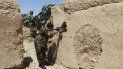 Soldados toman posiciones en el punto de control del área de Babaji, en la provincia de Helmand, Afganistán. Soldados toman posiciones en el punto de control del área de Babaji, en la provincia de Helmand, Afganistán.