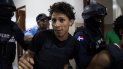 Rolfi Ferreras Cruz (cen.), presunto autor del disparo contra el expelotero de Grandes Ligas David Ortiz, es trasladado al Palacio de Justicia en Santo Domingo, República Dominicana. Rolfi Ferreras Cruz (cen.), presunto autor del disparo contra el expelotero de Grandes Ligas David Ortiz, es trasladado al Palacio de Justicia en Santo Domingo, República Dominicana.