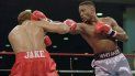 Su primer combate por un título mundial fue en Francia, una derrota ante el campeón mexicano José Luis Ramírez que le costó el invicto en 1998. Un año después cobraría revancha al superar al mexicano en su natal Norfolk, Virginia, para quedarse con el título ligero de la CMB. Su primer combate por un título mundial fue en Francia, una derrota ante el campeón mexicano José Luis Ramírez que le costó el invicto en 1998. Un año después cobraría revancha al superar al mexicano en su natal Norfolk, Virginia, para quedarse con el título ligero de la CMB.