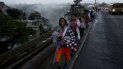 Fotografía de archivo fechada el 18 de octubre de 2018 de un grupo de migrantes hondureños saliendo de Ciudad de Guatemala con rumbo a Estados Unidos. Fotografía de archivo fechada el 18 de octubre de 2018 de un grupo de migrantes hondureños saliendo de Ciudad de Guatemala con rumbo a Estados Unidos.