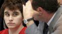 Nikolas Cruz, el asesino de Parkland, escucha a uno de sus abogados durante una audiencia. Nikolas Cruz, el asesino de Parkland, escucha a uno de sus abogados durante una audiencia.