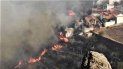 En esta foto difundida por el cabildo de Gran Canaria se ve un incendio cerca de unas casas en El Rincón, en la isla de España, el domingo 18 de agosto de 2019. En esta foto difundida por el cabildo de Gran Canaria se ve un incendio cerca de unas casas en El Rincón, en la isla de España, el domingo 18 de agosto de 2019.