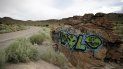 Fotografía del 22 de julio de 2019 de un graffiti con temática de aliens sobre una roca en una carretera de Rachel, Nevada, una localidad cercana al Área 51. Fotografía del 22 de julio de 2019 de un graffiti con temática de aliens sobre una roca en una carretera de Rachel, Nevada, una localidad cercana al Área 51.