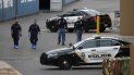 En imagen de archivo del martes 6 de agosto de 2019, un grupo de policías recorre la zona detrás de una tienda Walmart en el lugar de la masacre cerca de un centro comercial, en El Paso, Texas. En imagen de archivo del martes 6 de agosto de 2019, un grupo de policías recorre la zona detrás de una tienda Walmart en el lugar de la masacre cerca de un centro comercial, en El Paso, Texas.