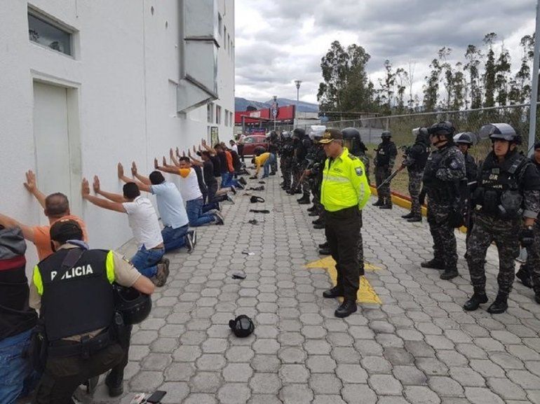 Extranjeros detenidos en Quito en el marco de las protestas contra el Gobierno de Lenín Moreno.
