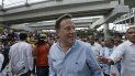 En esta foto de archivo del 25 de abril de 2019, el entonces presidente panameño Juan Carlos Varela asiste a la ceremonia de inauguración de la línea 2 del metro en Panamá. En esta foto de archivo del 25 de abril de 2019, el entonces presidente panameño Juan Carlos Varela asiste a la ceremonia de inauguración de la línea 2 del metro en Panamá.