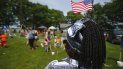 Fotografía de archivo del 4 de julio de 2019 de Malu Klo, una mujer en busca de asilo originaria de Congo, durante un picnic para refugiados en el parque Fort Williams en Cape Elizabeth, Maine. Fotografía de archivo del 4 de julio de 2019 de Malu Klo, una mujer en busca de asilo originaria de Congo, durante un picnic para refugiados en el parque Fort Williams en Cape Elizabeth, Maine.