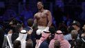 Anthony Joshua celebra tras vencer a Andy Ruiz Jr. en la pelea de título pesado en Riyad, Arabia Saudita, el sábado 7 de diciembre de 2019. Anthony Joshua celebra tras vencer a Andy Ruiz Jr. en la pelea de título pesado en Riyad, Arabia Saudita, el sábado 7 de diciembre de 2019.