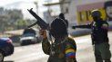 Miembros de los llamados colectivos, grupos partidarios del gobierno, participan junto con la Milicia Nacional Bolivariana en un ejercicio militar en el barrio 23 de Enero, Caracas, Venezuela, sábado 15 de febrero de 2020. Miembros de los llamados colectivos, grupos partidarios del gobierno, participan junto con la Milicia Nacional Bolivariana en un ejercicio militar en el barrio 23 de Enero, Caracas, Venezuela, sábado 15 de febrero de 2020.