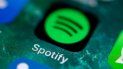 El icono de la aplicación del servicio de música Spotify se puede ver en la pantalla de un iPhone. El icono de la aplicación del servicio de música Spotify se puede ver en la pantalla de un iPhone.