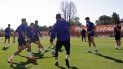 En esta foto proporcionada por el Atlético de Madrid, los jugadores del equipo participan en un entrenamiento de grupo en Madrid, el lunes 18 de mayo de 2020. En esta foto proporcionada por el Atlético de Madrid, los jugadores del equipo participan en un entrenamiento de grupo en Madrid, el lunes 18 de mayo de 2020.