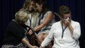 En esta imagen del 14 de agosto de 2018, víctimas de abuso sexual por parte de miembros del clero, o familiares de ellas, rompen en llanto mientras el secretario de Justicia de Pensilvania Josh Shapiro habla en una conferencia de prensa en el Capitolio Estatal, en Harrisburg, Pensilvania. En esta imagen del 14 de agosto de 2018, víctimas de abuso sexual por parte de miembros del clero, o familiares de ellas, rompen en llanto mientras el secretario de Justicia de Pensilvania Josh Shapiro habla en una conferencia de prensa en el Capitolio Estatal, en Harrisburg, Pensilvania.