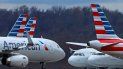 En esta foto del 31 de marzo del 2020, aviones de American Airlines están estacionados en el Aeropuerto Internacional de Pittsburgh. American Airlines comenzará a reservar vuelos a plena capacidad a partir del miércoles, 1 de julio. Eso contrasta marcadamente con sus rivales, incluyendo Delta, que limitan las reservaciones para crear espacio entre los pasajeros. En esta foto del 31 de marzo del 2020, aviones de American Airlines están estacionados en el Aeropuerto Internacional de Pittsburgh. American Airlines comenzará a reservar vuelos a plena capacidad a partir del miércoles, 1 de julio. Eso contrasta marcadamente con sus rivales, incluyendo Delta, que limitan las reservaciones para crear espacio entre los pasajeros.