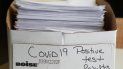 Una pila de documentos detallando los casos positivos de COVID-19, en una caja en las oficinas del Departamento de Salud Pública del condado Toledo-Lucas, en Ohio, el 24 de junio de 2020. Una pila de documentos detallando los casos positivos de COVID-19, en una caja en las oficinas del Departamento de Salud Pública del condado Toledo-Lucas, en Ohio, el 24 de junio de 2020.