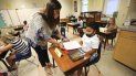 Una maestra y una alumna en la escuela Corinth Elementary School en Corinth, Mississippi, el 27 de julio del 2020. Una maestra y una alumna en la escuela Corinth Elementary School en Corinth, Mississippi, el 27 de julio del 2020.