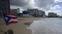 Fotografía de mayo de 2020 de una bandera en una playa de Puerto Rico. Fotografía de mayo de 2020 de una bandera en una playa de Puerto Rico.