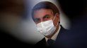 El presidente de Brasil Jair Bolsonaro asiste con una mascarilla a una ceremonia en el Palacio Presidencial de Planalto en Brasilia. El presidente de Brasil Jair Bolsonaro asiste con una mascarilla a una ceremonia en el Palacio Presidencial de Planalto en Brasilia.