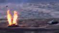 Una captura de imagen tomada de un video disponible en el sitio web oficial del Ministerio de Defensa armenio el 27 de septiembre de 2020, supuestamente muestra la destrucción de vehículos militares azeríes durante los enfrentamientos entre separatistas armenios y Azerbaiyán en la región separatista de Nagorno-Karabaj. Una captura de imagen tomada de un video disponible en el sitio web oficial del Ministerio de Defensa armenio el 27 de septiembre de 2020, supuestamente muestra la destrucción de vehículos militares azeríes durante los enfrentamientos entre separatistas armenios y Azerbaiyán en la región separatista de Nagorno-Karabaj.