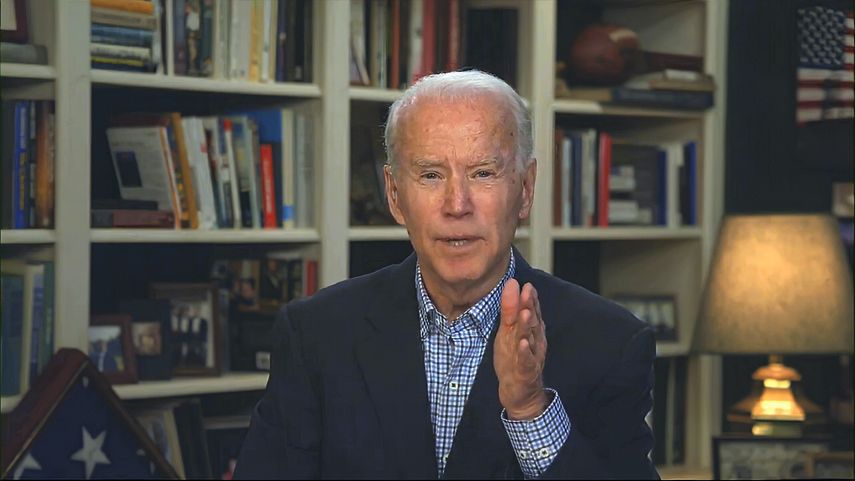 En esta imagen distribuida por la campaña presidencial de Biden, el candidato presidencial demócrata Joe Biden habla en una conferencia de prensa virtual, miércoles 25 de marzo de 2020. 