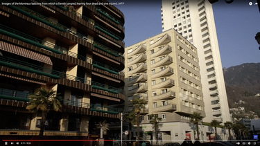 Una captura de pantalla del video publicado por la agencia AFP donde se ve el edificio desde el que saltaron los miembros de una familia en Suiza.&nbsp;