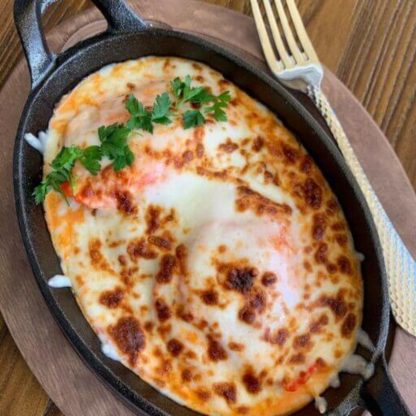 Cangrejo en salsa rosa gratinada.&nbsp;