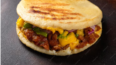 Arepa con salsa de chorizo Frescarini.