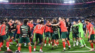 Los jugadores de Portugal celebran la victoria en la final de la Liga de Naciones de la UEFA entre Portugal y España en Múnich, sur de Alemania, el 8 de junio de 2025.