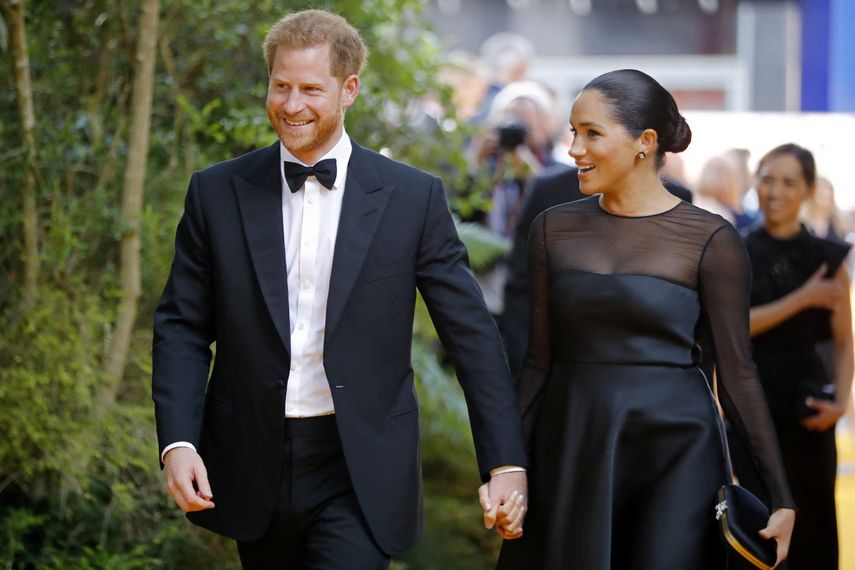 El príncipe Harry de Gran Bretaña, duque de Sussex, y Meghan, duquesa de Sussex, llegan al estreno europeo de la película El Rey León en Londres el 14 de julio de 2019.