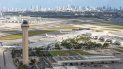 Vista parcial del Aeropuerto Internacional de Miami, con el centro de la ciudad en el fondo. Vista parcial del Aeropuerto Internacional de Miami, con el centro de la ciudad en el fondo.