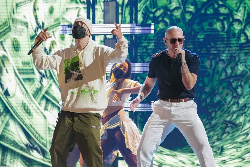 El cantante boricua Yandel y el cubanoamericano Pitbull.
