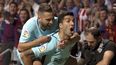 Luis Súarez (derecha) celebra luego de anotar junto con su compañero Jordi Alba.&nbsp;