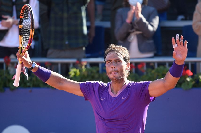 El español Rafael Nadal celebra su victoria sobre el británico Cameron Norrie durante el partido de cuartos de final del torneo ATP Barcelona Open de tenis individual en el Real Club de Tenis de Barcelona el 23 de abril de 2021