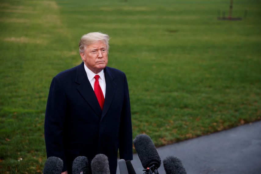 El presidente Donald&nbsp;Trump responde preguntas de los periodistas en la Casa Blanca.