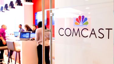 Logo de Comcast en una de sus tiendas de servicio al cliente.