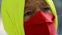 Fotografía de archivo del 23 de diciembre de 2020 de una mujer que participa en una protesta contra la forma en la que el presidente brasileño Jair Bolsonaro ha manejado la pandemia de coronavirus en Brasilia, Brasil Fotografía de archivo del 23 de diciembre de 2020 de una mujer que participa en una protesta contra la forma en la que el presidente brasileño Jair Bolsonaro ha manejado la pandemia de coronavirus en Brasilia, Brasil