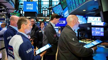 Agentes de la Bolsa de Nueva York en una sesión de trabajo.