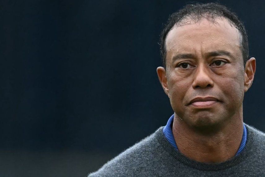 El golfista estadounidense Tiger Woods reacciona durante la primera ronda del día inaugural en el British Open Golf Championship, el 18 de julio de 2024.