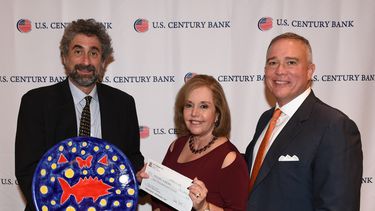 Mitchell Kaplan, Aida Levitan y Luis De La Aguilera.
