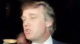 Donald Trump responde a las preguntas de los periodistas el 19 de junio de 1991 antes de ofrecer un recorrido por una de sus torres de condominios. 