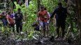 Migrantes venezolanos llegan a la aldea de Canaan Membrillo, el primer control fronterizo de la provincia de Darién en Panamá, el 13 de octubre de 2022.&nbsp;&nbsp; &nbsp; &nbsp;