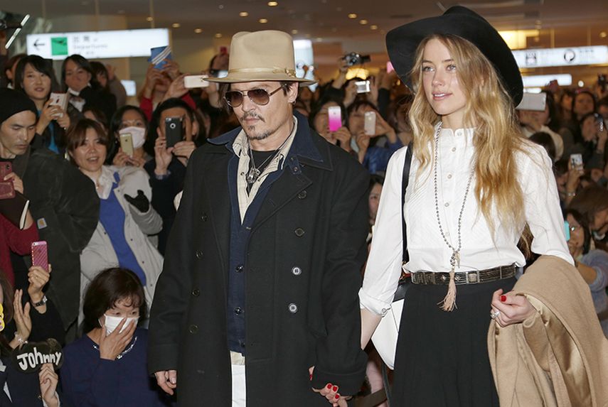 El actor Johnny Depp, a su llegada a Tokio con su prometida. (AP)