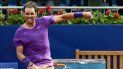 El español Rafael Nadal celebra la derrota del japonés Kei Nishikori durante el partido de individuales del torneo ATP Barcelona Open de tenis en el Real Club de Tenis de Barcelona el 22 de abril de 2021 El español Rafael Nadal celebra la derrota del japonés Kei Nishikori durante el partido de individuales del torneo ATP Barcelona Open de tenis en el Real Club de Tenis de Barcelona el 22 de abril de 2021