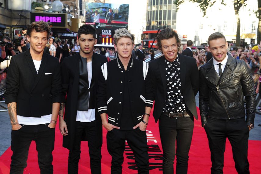 De izquierda a derecha: Louis Tomlinson, Zayn Malik, Niall Horan, Harry Styles y Liam Payne llegan al estreno mundial de One Direction: This Is Us en el Empire Leicester Square, en Londres, el 20 de agosto de 2013.